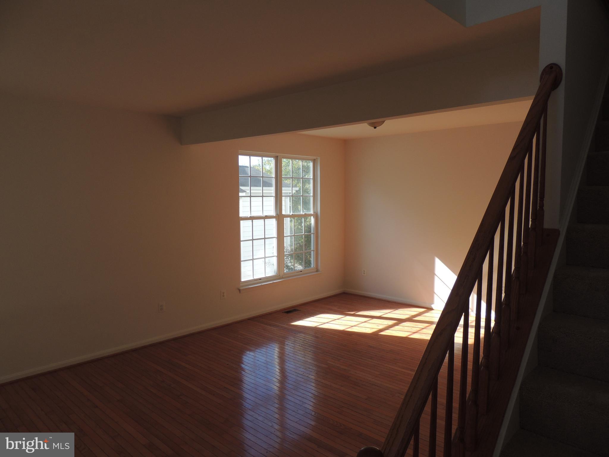 17676 Hampstead Ridge Court Dumfries, VA 22026 - Photo 4 of 22 a view of an empty room and window