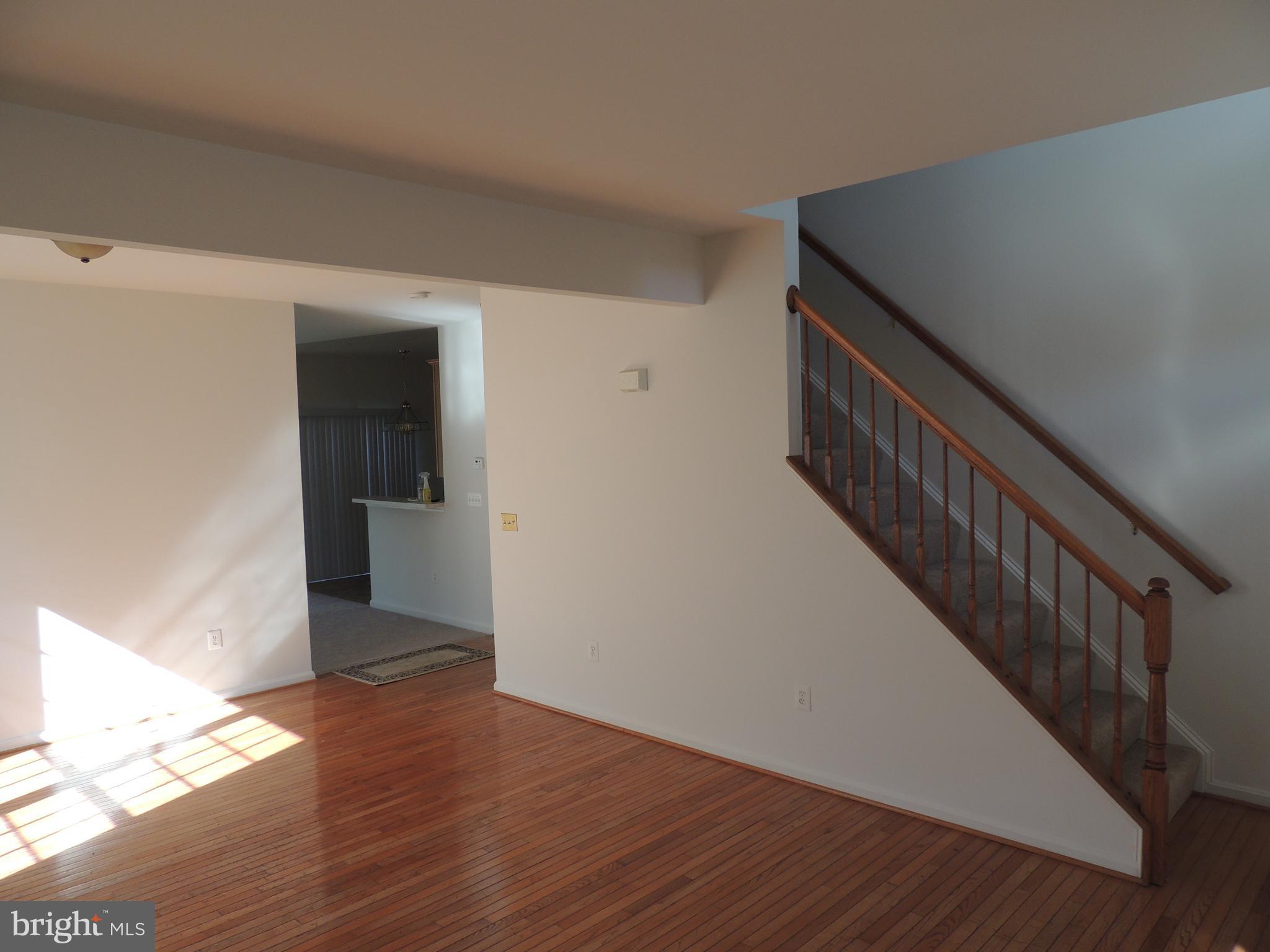 17676 Hampstead Ridge Court Dumfries, VA 22026 - Photo 5 of 22 a view of entryway with wooden floor