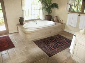 996 La Paz Road Montecito, CA 93108 - Photo 12 of 17 a bathroom with a bathtub and window
