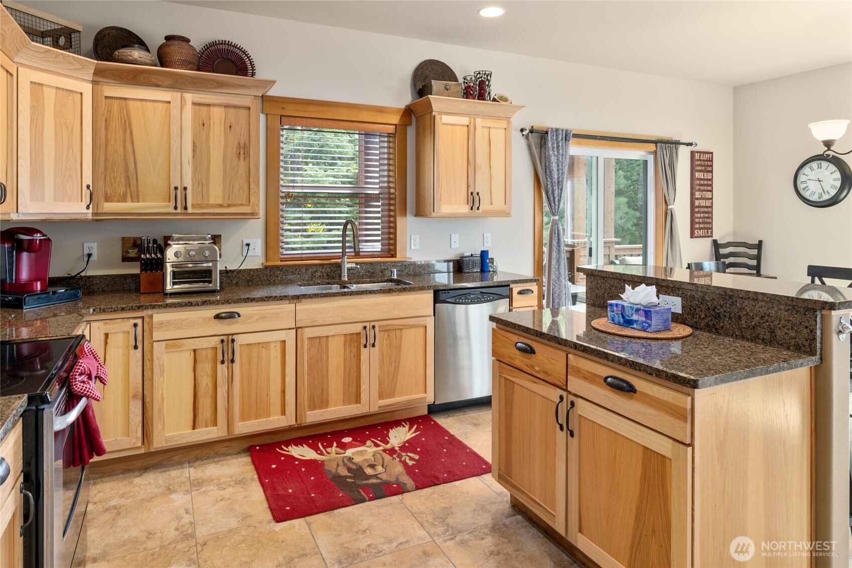 150 Tiger Lily Lane Ronald, WA 98940 - Photo 14 of 40 a kitchen with a sink stove and cabinets
