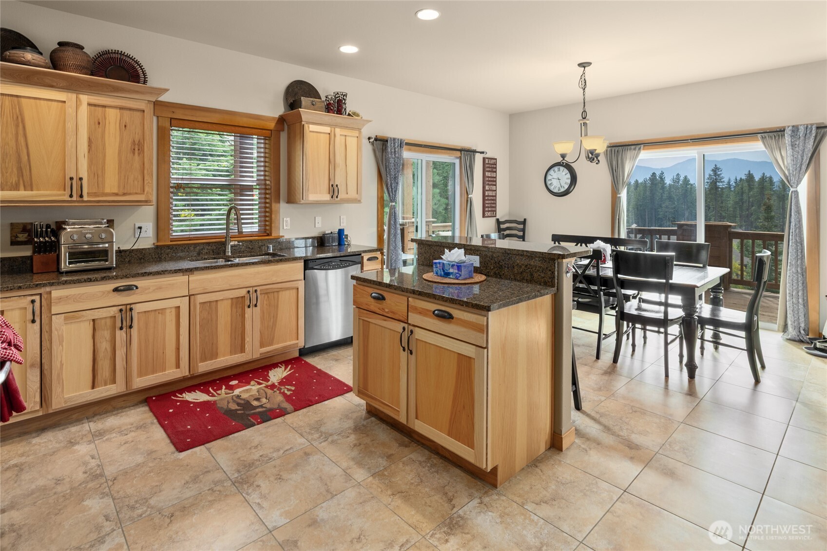 150 Tiger Lily Lane Ronald, WA 98940 - Photo 15 of 40 a kitchen with stainless steel appliances granite countertop a stove a sink and a microwave