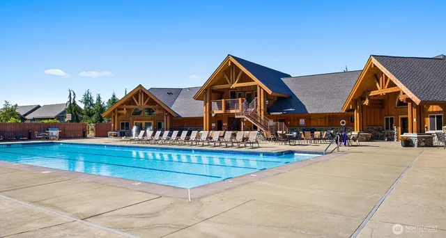 a view of a swimming pool with a patio