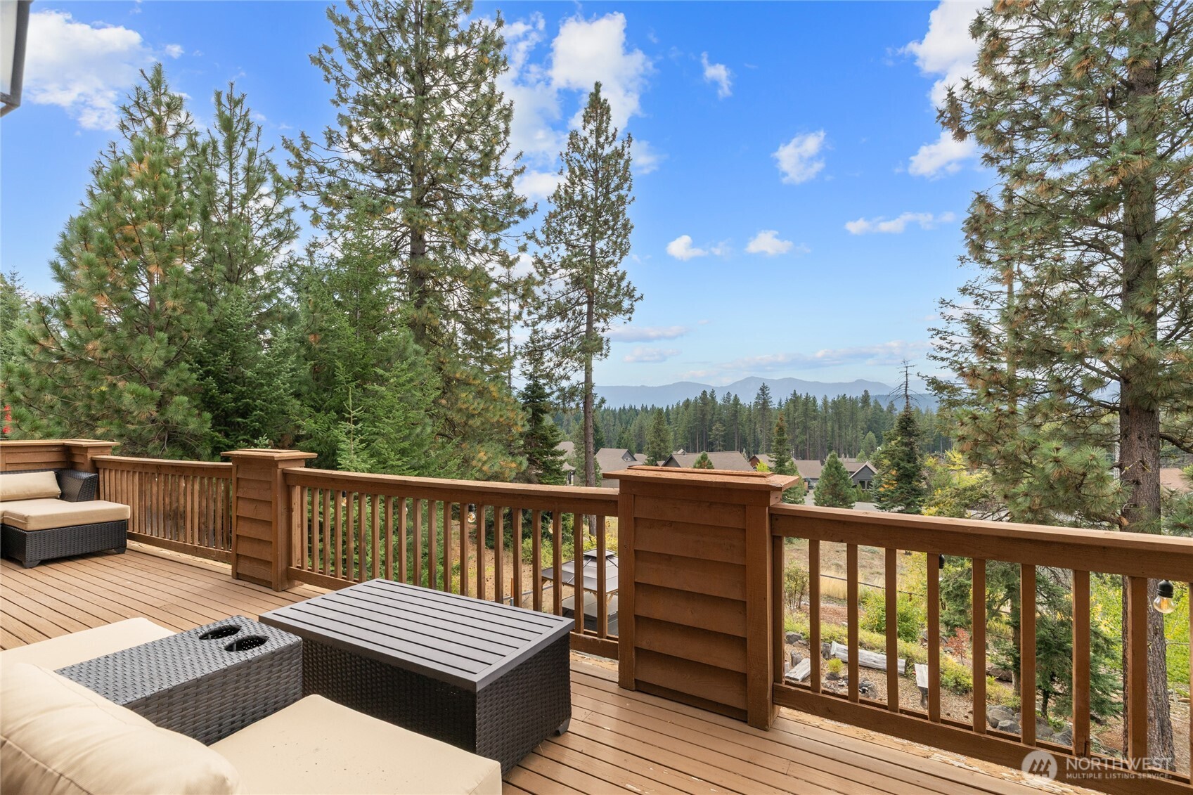 150 Tiger Lily Lane Ronald, WA 98940 - Photo 8 of 40 a view of a roof deck with couches and wooden floor