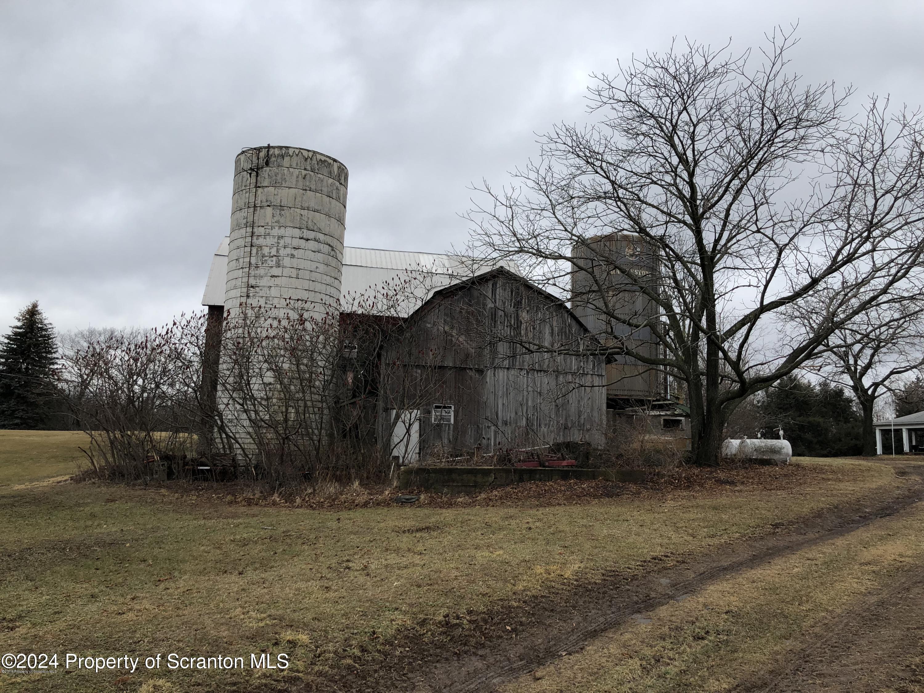 Red Oak Drive Clarks Summit, PA 18411 - Photo 6 of 7 a view of large house with a big yard