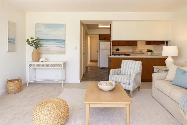 a living room with furniture and a table