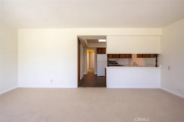 a view of a kitchen with a sink
