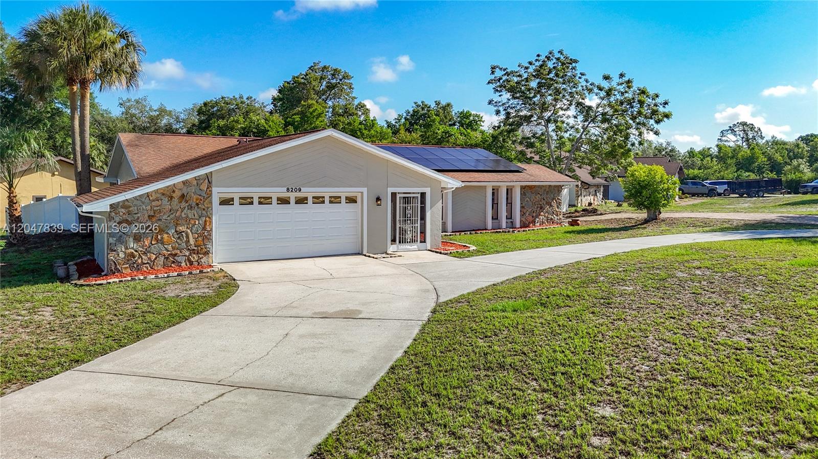 8209 Chaucer Drive Spring Hill, FL 34607 - Photo 4 of 48