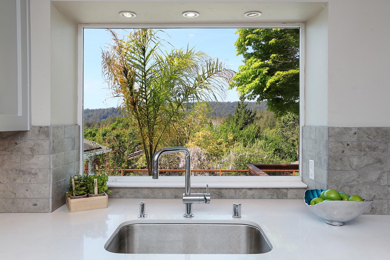 424 Sims Road Santa Cruz, CA 95060 - Photo 11 of 37 a bathroom sink with a granite countertop window and a sink