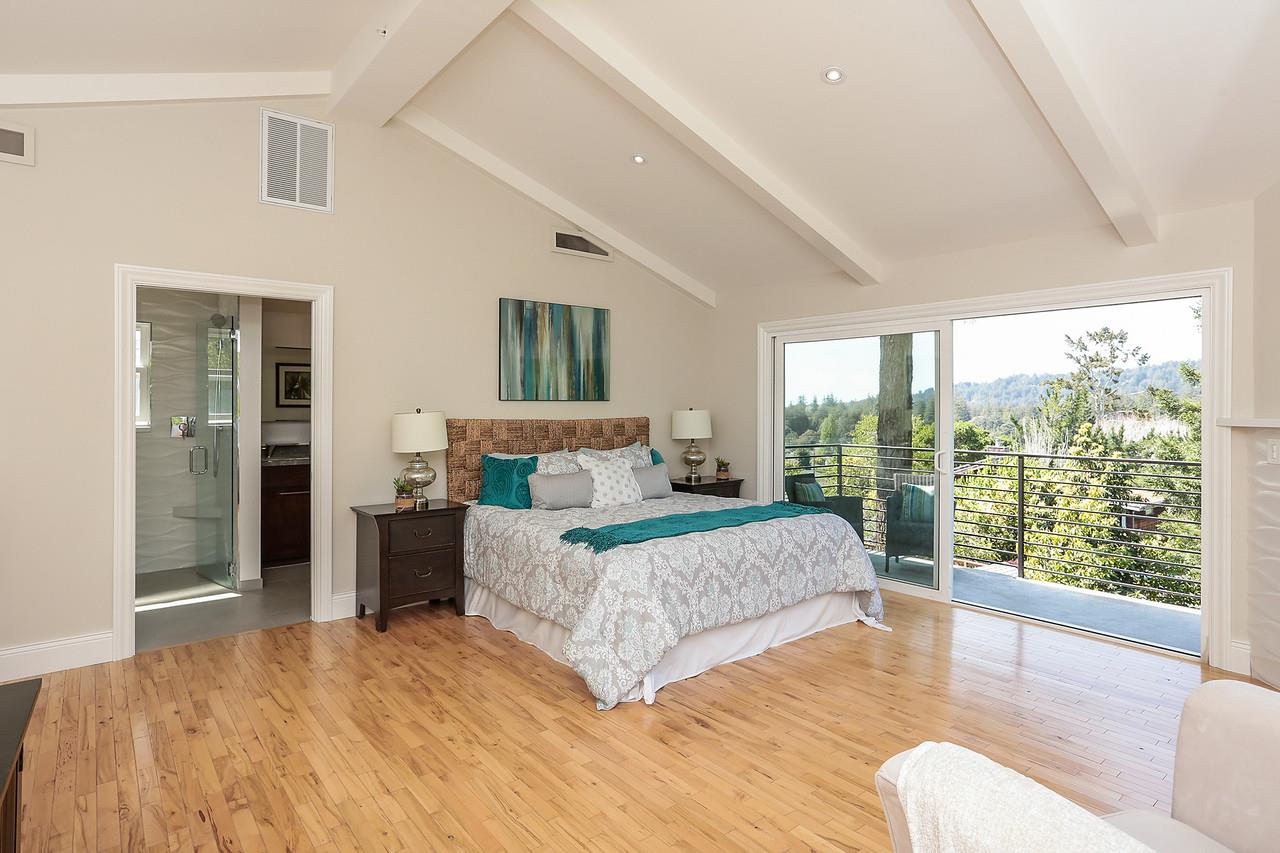 424 Sims Road Santa Cruz, CA 95060 - Photo 16 of 37 a bedroom with a large bed and a large window