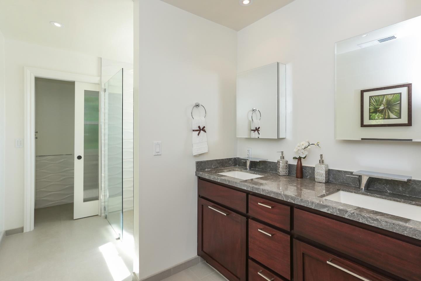 424 Sims Road Santa Cruz, CA 95060 - Photo 18 of 37 a bathroom with double sink and a mirror
