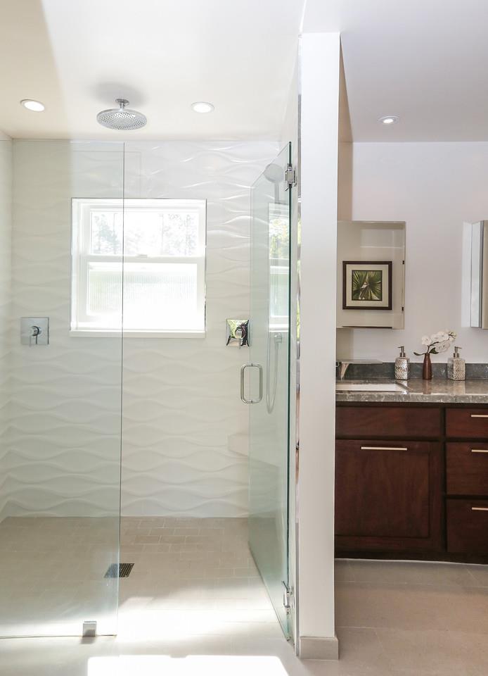 424 Sims Road Santa Cruz, CA 95060 - Photo 19 of 37 a bathroom with a shower sink and mirror