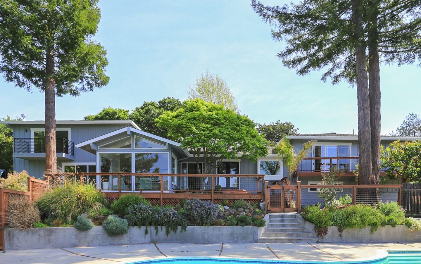 424 Sims Road Santa Cruz, CA 95060 - Photo 2 of 37 a front view of a house with plants and trees