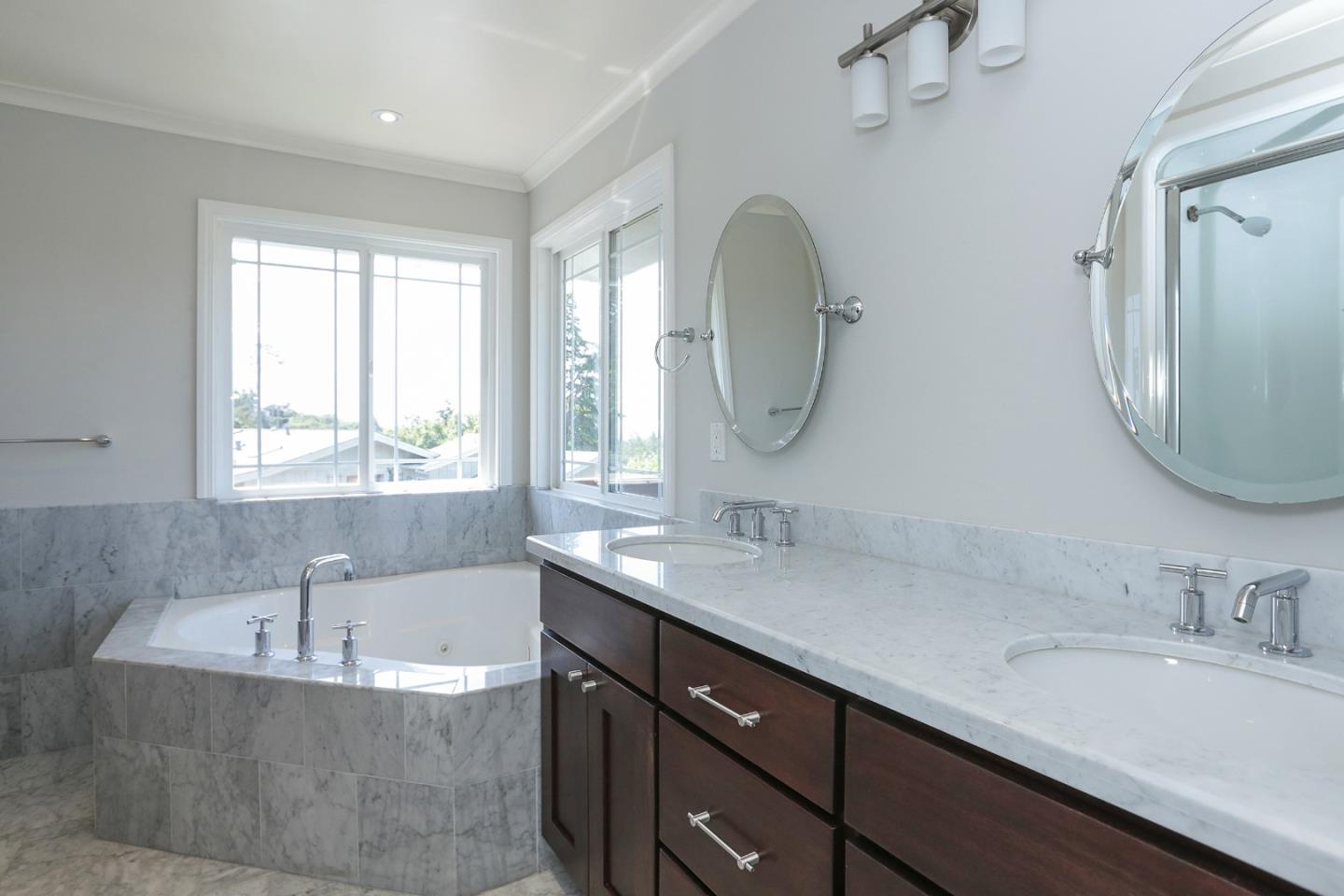 424 Sims Road Santa Cruz, CA 95060 - Photo 21 of 37 a bathroom with a tub sink and mirror