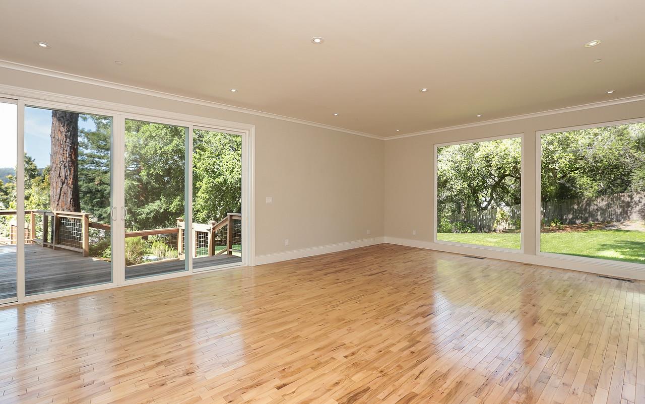 424 Sims Road Santa Cruz, CA 95060 - Photo 22 of 37 an empty room with wooden floor and windows