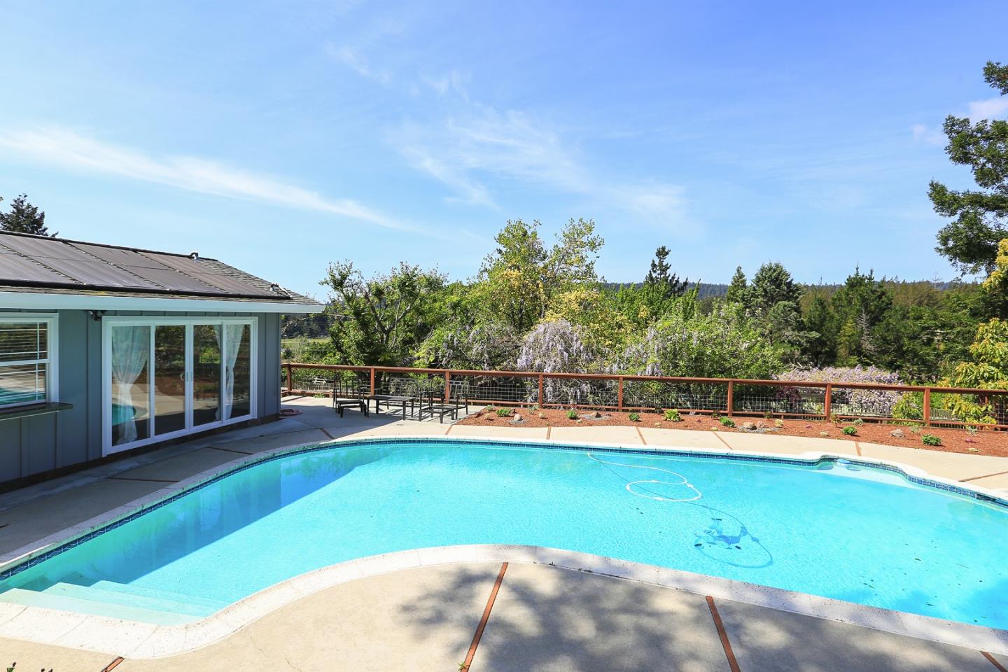 424 Sims Road Santa Cruz, CA 95060 - Photo 32 of 37 a view of a swimming pool with an outdoor seating and a garden