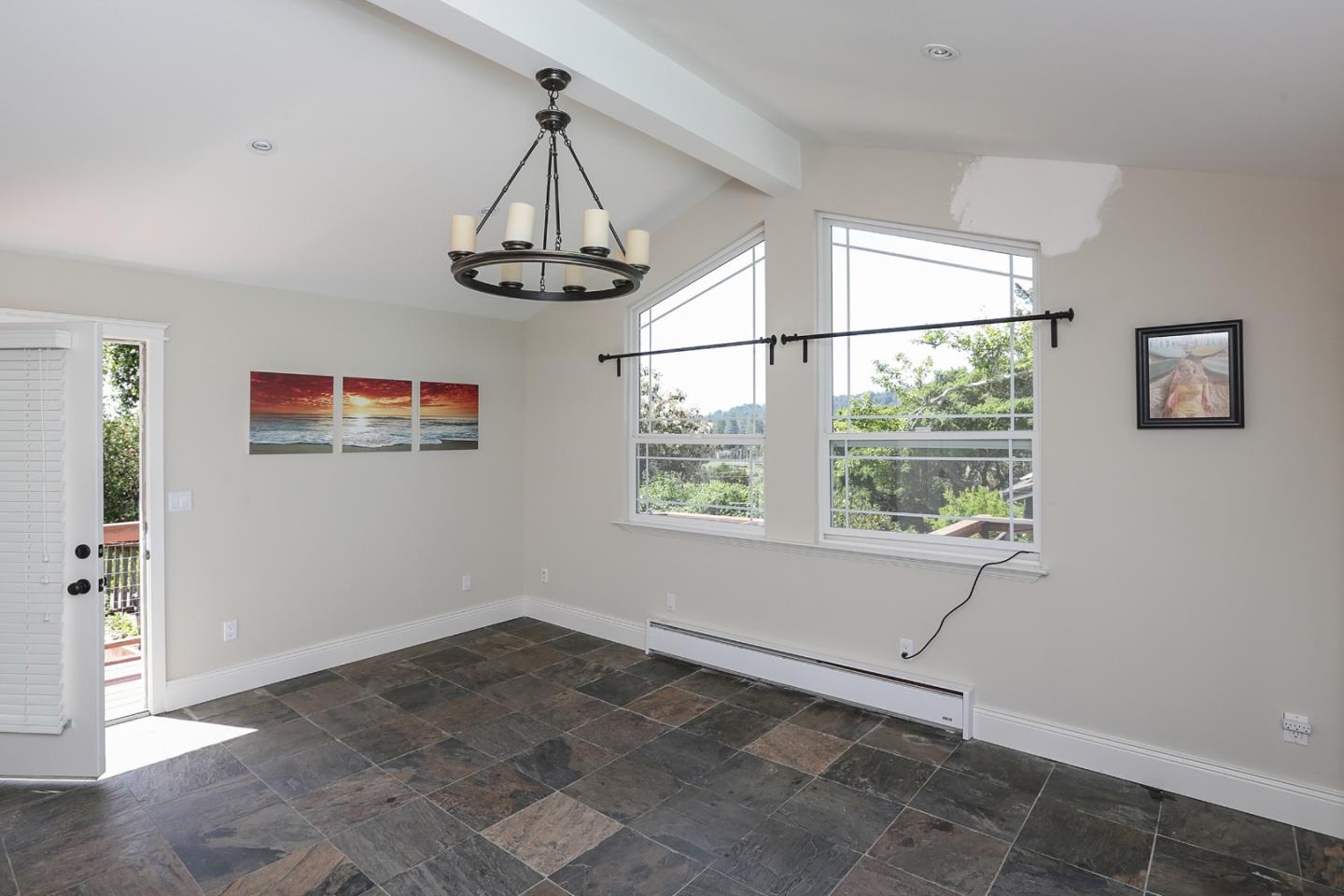 424 Sims Road Santa Cruz, CA 95060 - Photo 34 of 37 a view of a livingroom with a ceiling fan and window