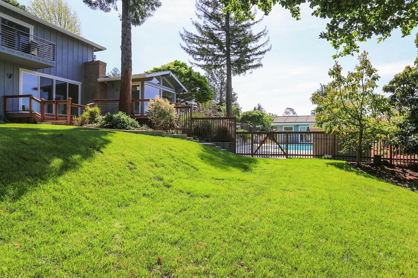 424 Sims Road Santa Cruz, CA 95060 - Photo 35 of 37 a view of a house with backyard and a tree
