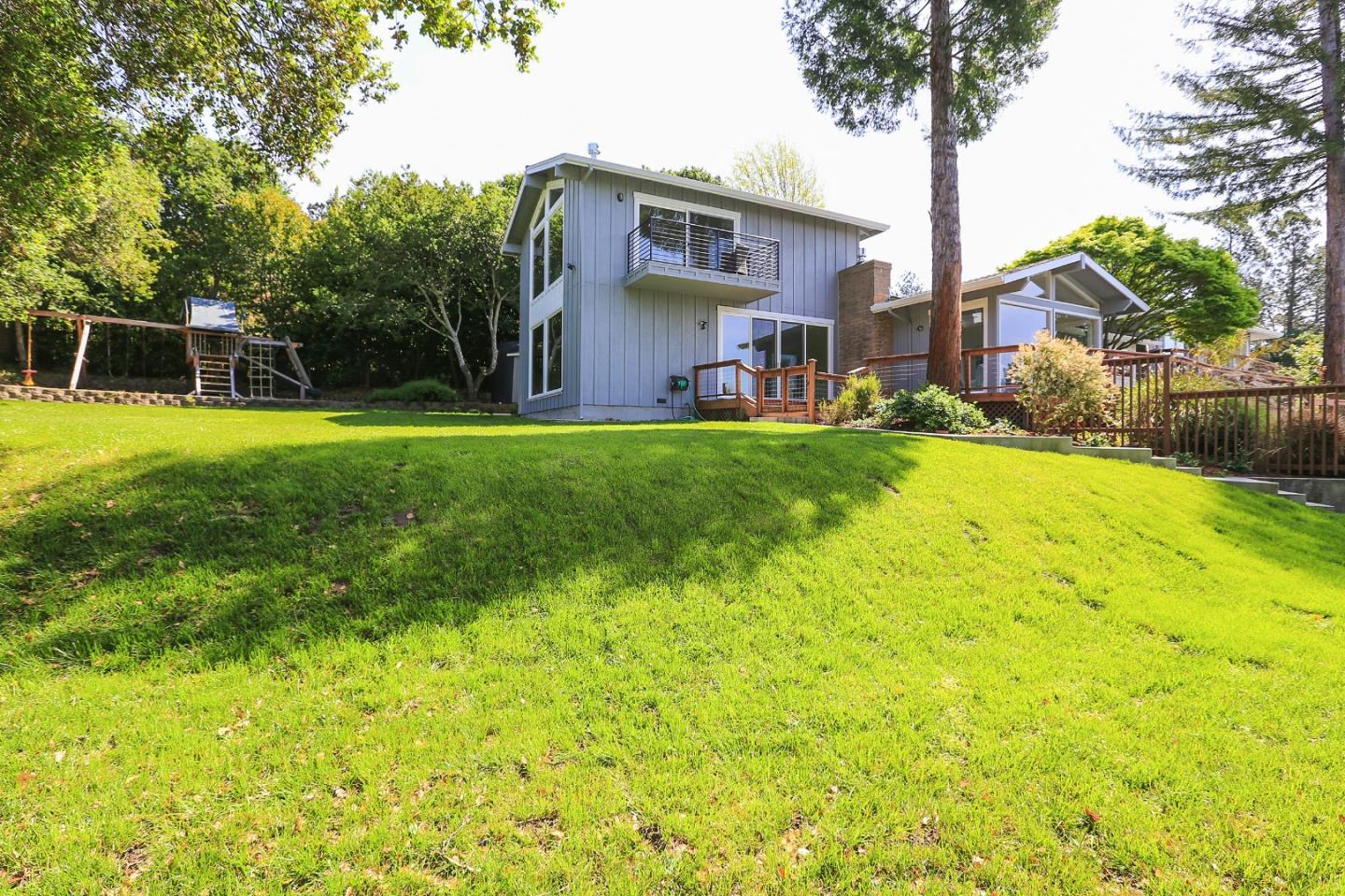 424 Sims Road Santa Cruz, CA 95060 - Photo 36 of 37 a front view of a house with yard and trees