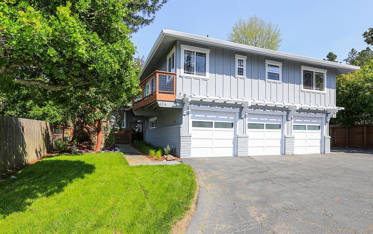 424 Sims Road Santa Cruz, CA 95060 - Photo 37 of 37 a front view of a house with a yard and garage