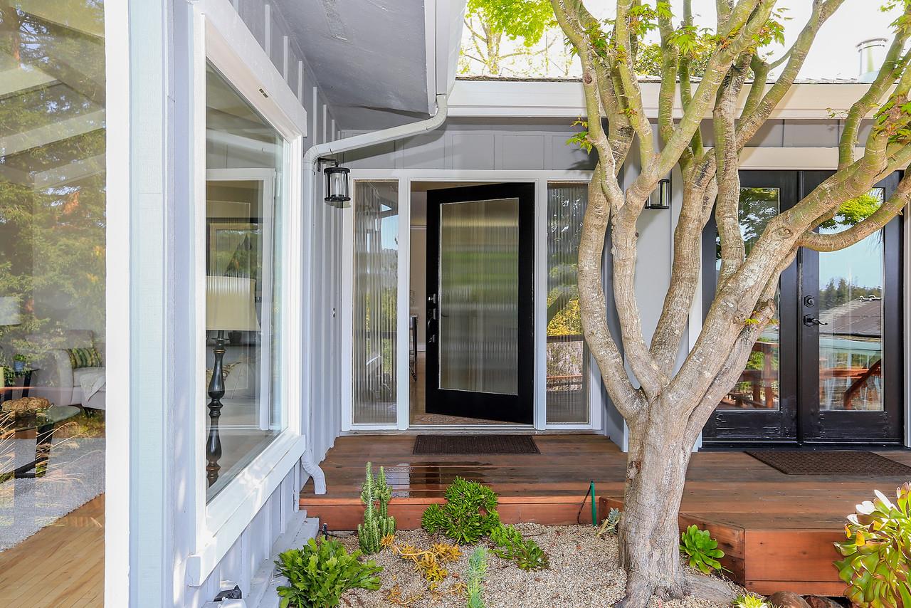 424 Sims Road Santa Cruz, CA 95060 - Photo 4 of 37 a front view of a house with a tree