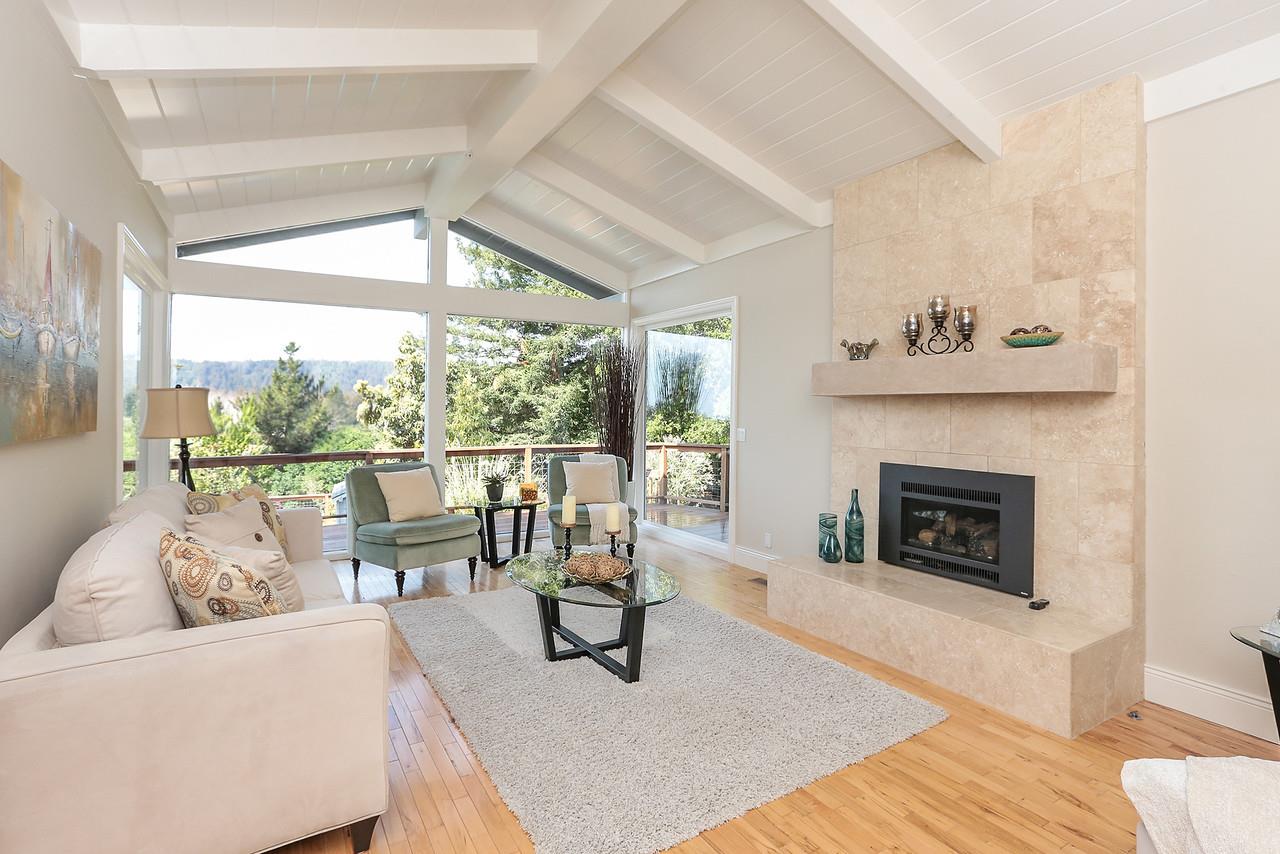 424 Sims Road Santa Cruz, CA 95060 - Photo 7 of 37 a living room with furniture and a fireplace