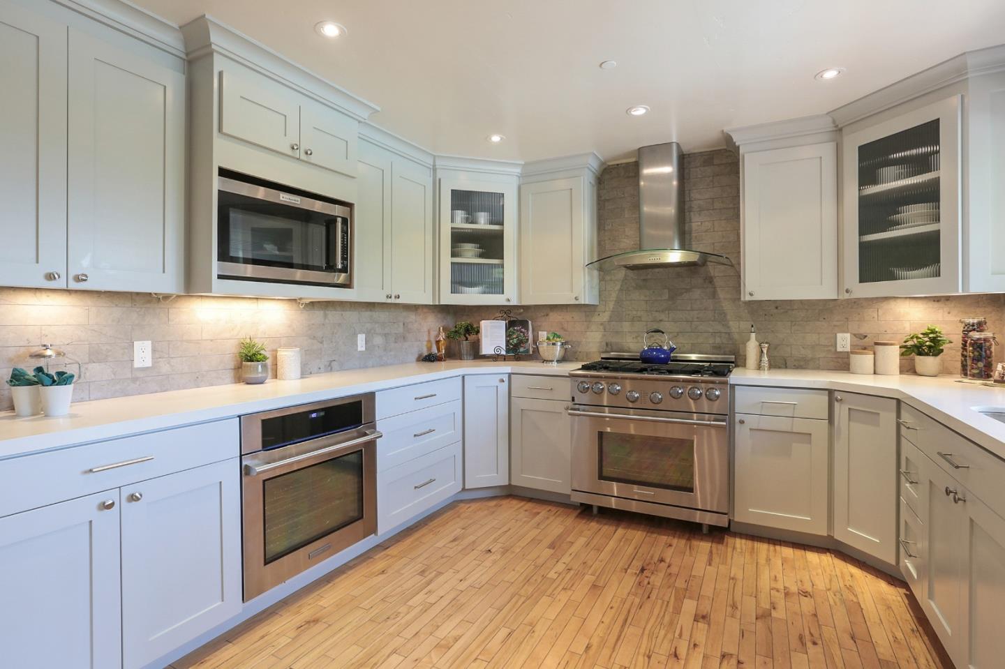 424 Sims Road Santa Cruz, CA 95060 - Photo 10 of 37 a kitchen with granite countertop cabinets stainless steel appliances and a sink