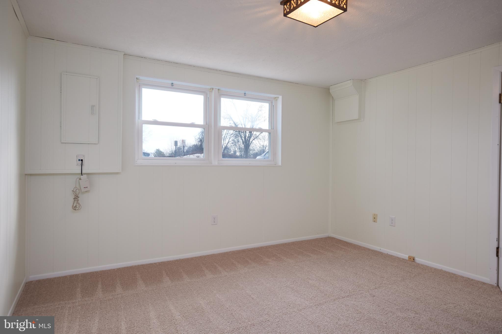 17502 Kohlhoss Road Poolesville, MD 20837 - Photo 18 of 26 Lower level family room
