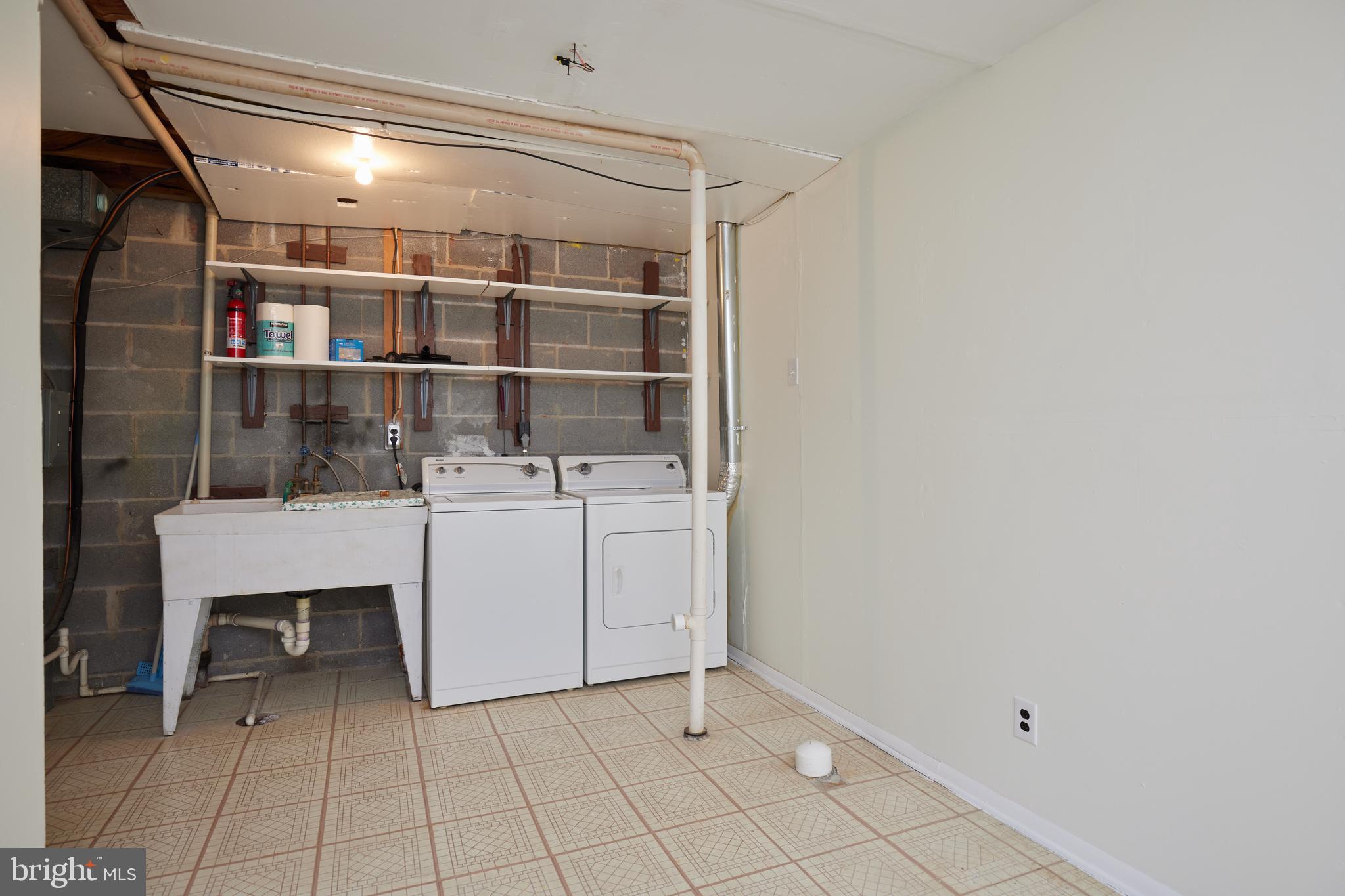 17502 Kohlhoss Road Poolesville, MD 20837 - Photo 20 of 26 Laundry area with rough in bathroom