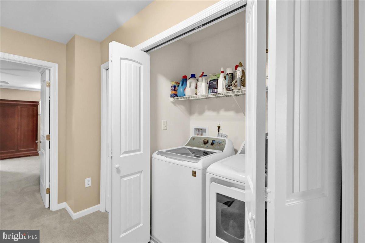 33 Michael Lane Denver, PA 17517 - Photo 18 of 24 Efficient laundry space with organized storage.