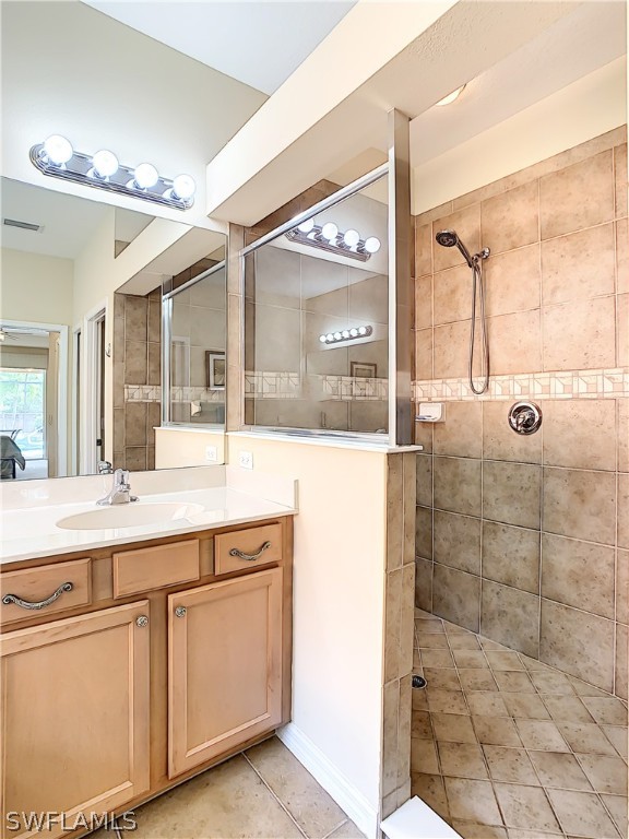 2816 Via Piazza Loop Fort Myers, FL 33905 - Photo 20 of 34 a bathroom with a shower and a sink