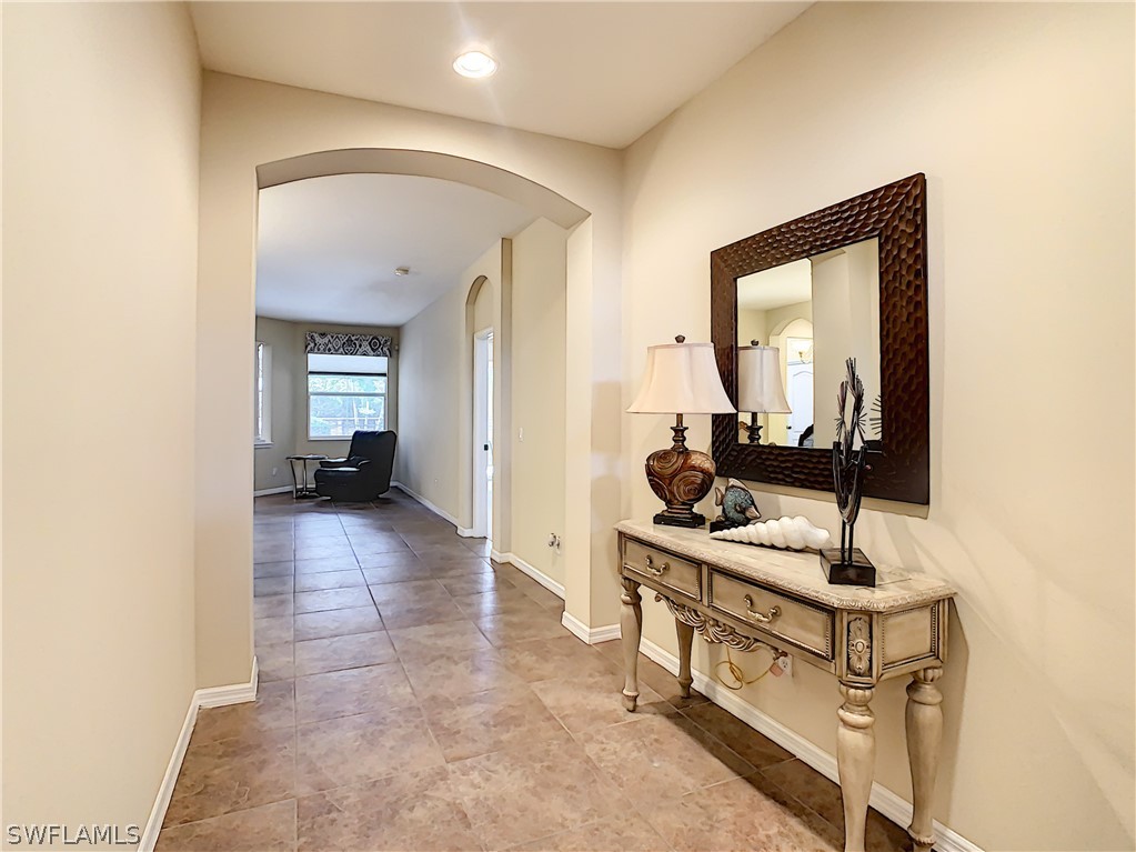 2816 Via Piazza Loop Fort Myers, FL 33905 - Photo 3 of 34 a view of a hallway with workspace