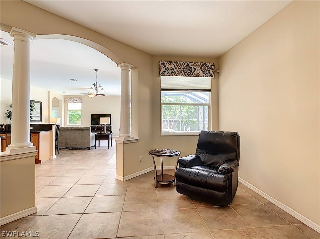 2816 Via Piazza Loop Fort Myers, FL 33905 - Photo 4 of 34 a living room with furniture and a window