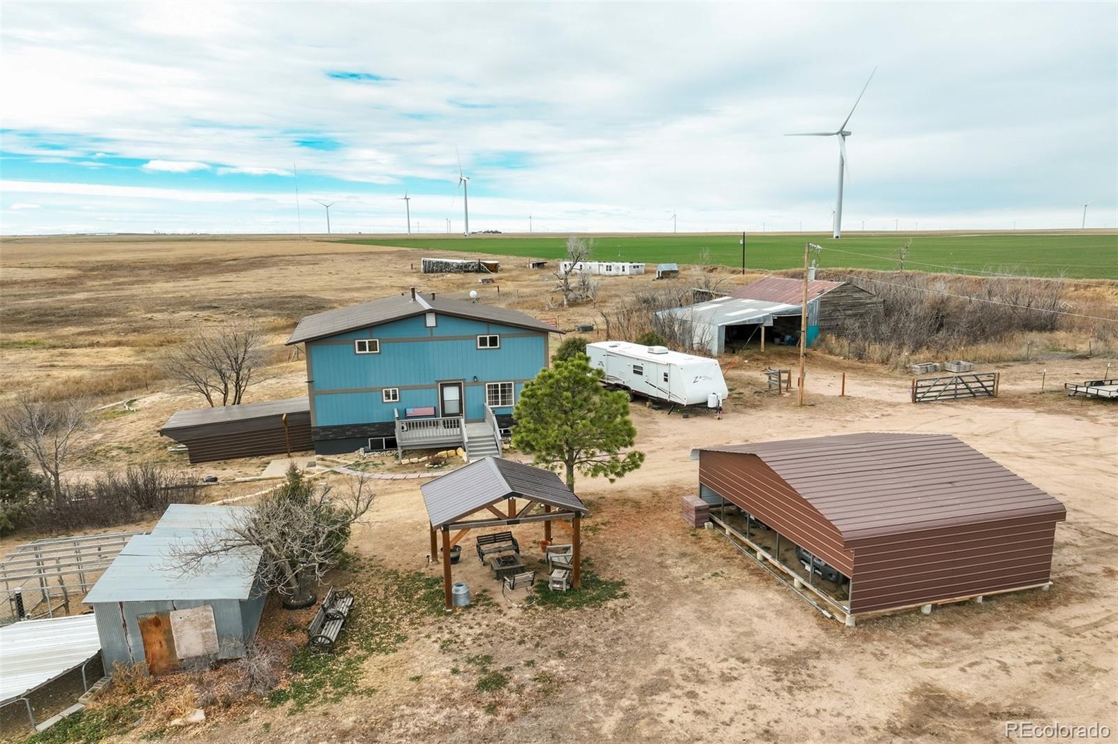 53647 County Road Genoa, CO 80818 - Photo 13 of 47 view of a terrace with lawn chairs