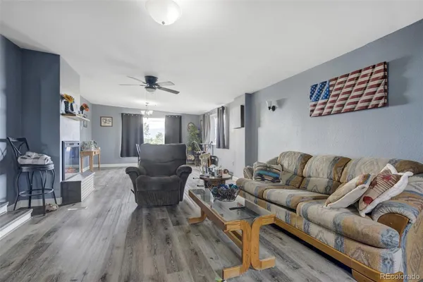 a kitchen with a table and chairs in it