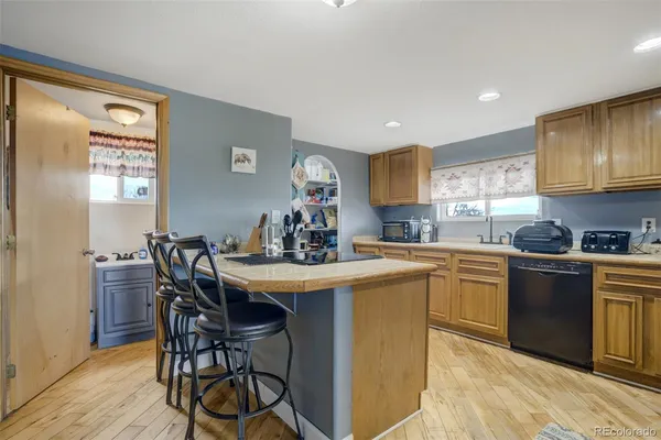 a kitchen with a stove and cabinets