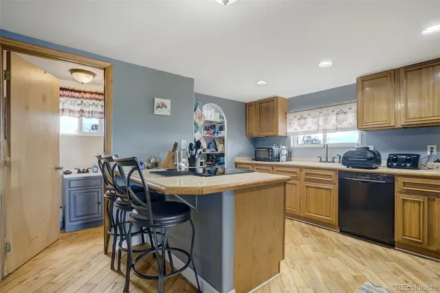 a kitchen with a stove and cabinets