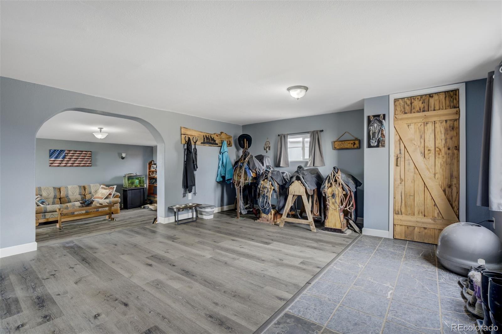 53647 County Road Genoa, CO 80818 - Photo 18 of 47 a view of a room with gym equipment