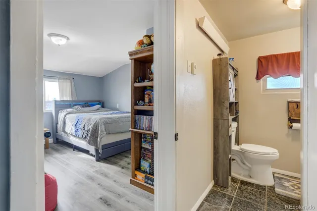a bathroom with a sink a vanity and a mirror