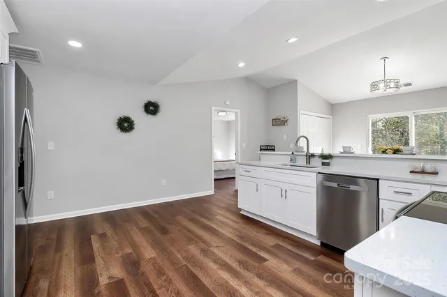 a large kitchen with cabinets