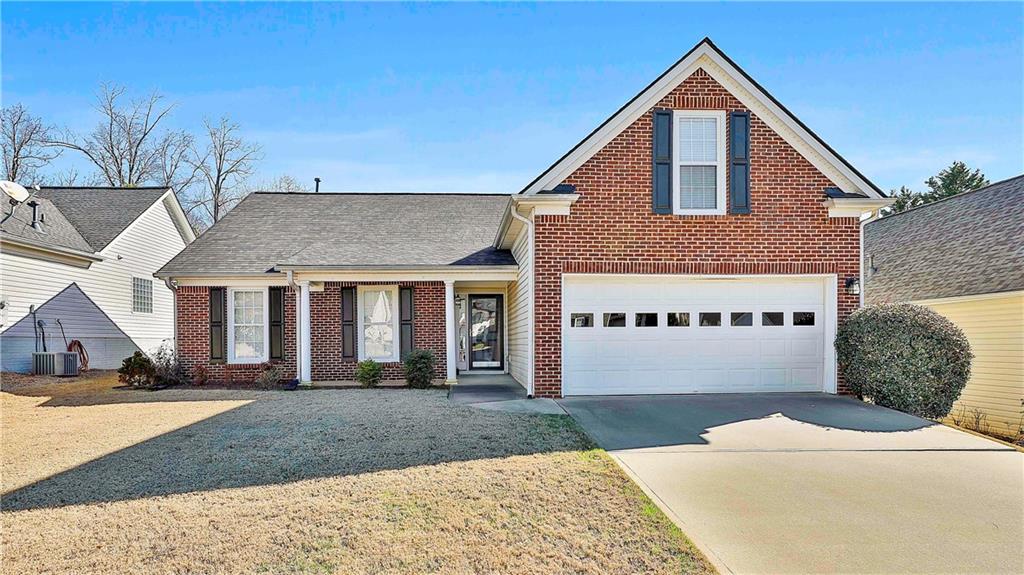 46 Crimson Way Newnan, GA 30265 - Photo 1 of 1 a front view of a house with a yard