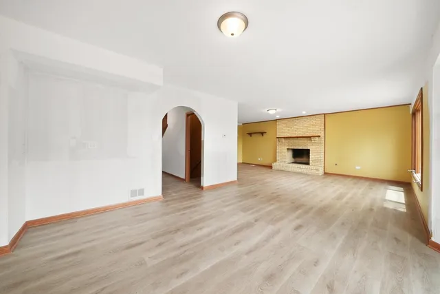 a view of a livingroom with wooden floor