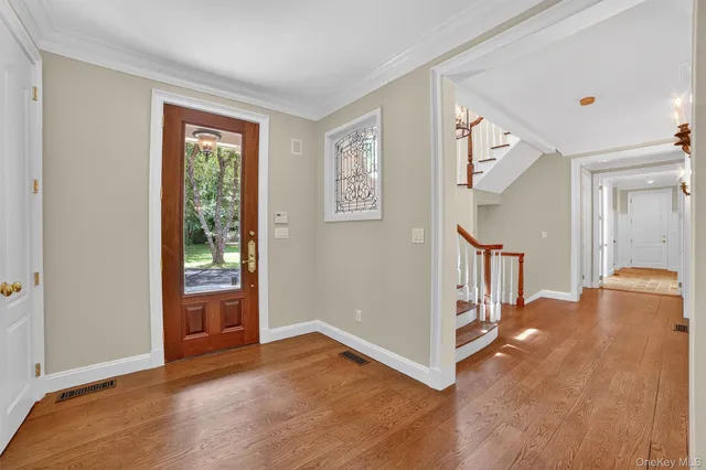 a view of a hallway with front door