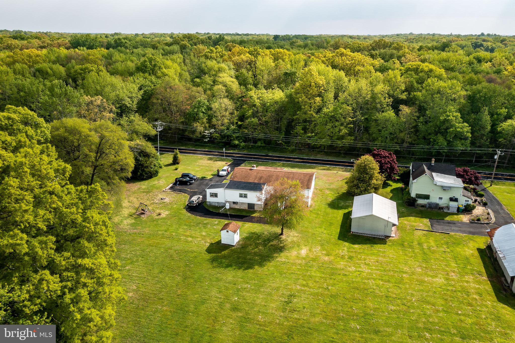 2956 Frazer Road Newark, DE 19702 - Photo 11 of 16 a view of a swimming pool with a patio and a yard