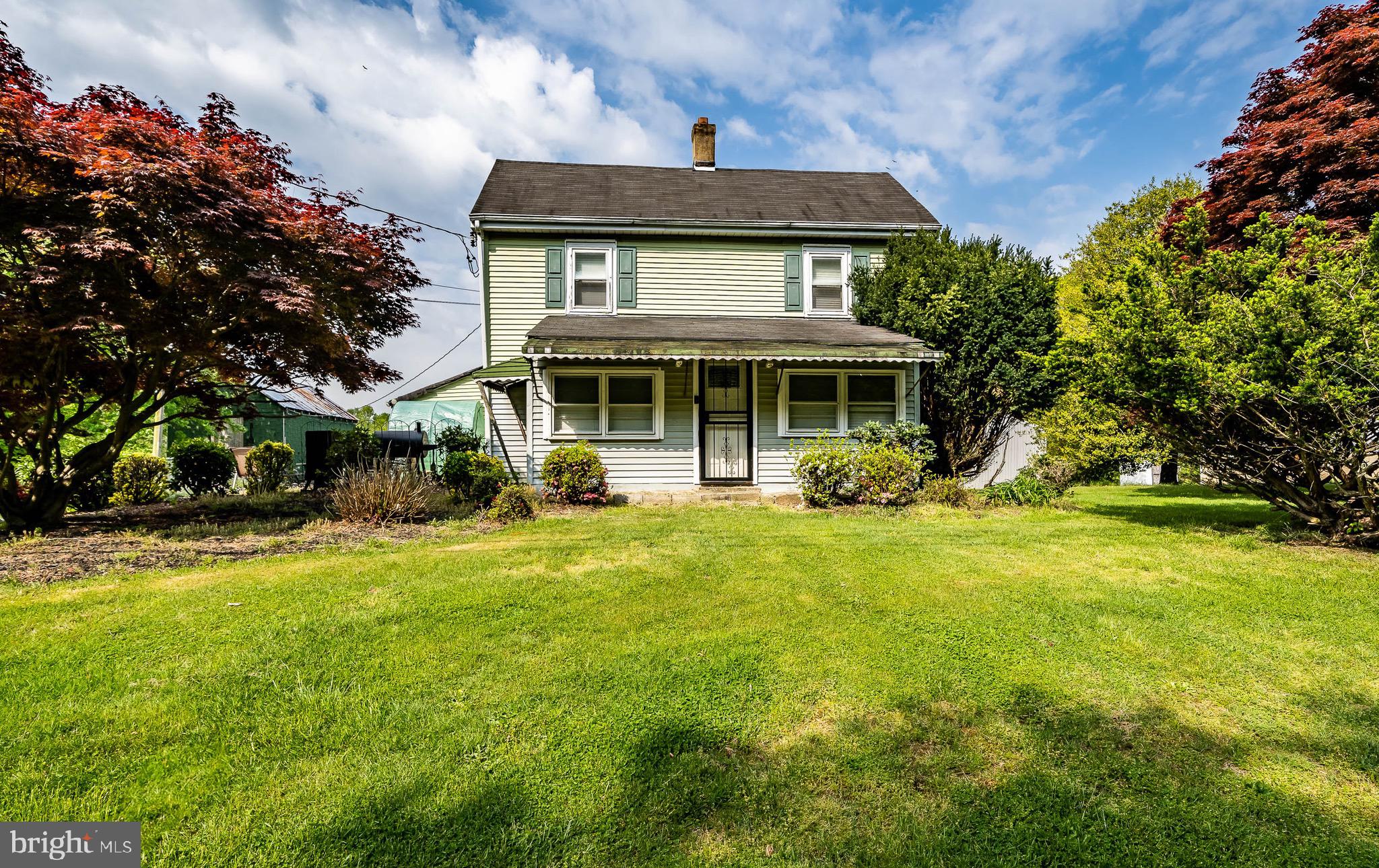 2956 Frazer Road Newark, DE 19702 - Photo 12 of 16 a front view of a house with a yard