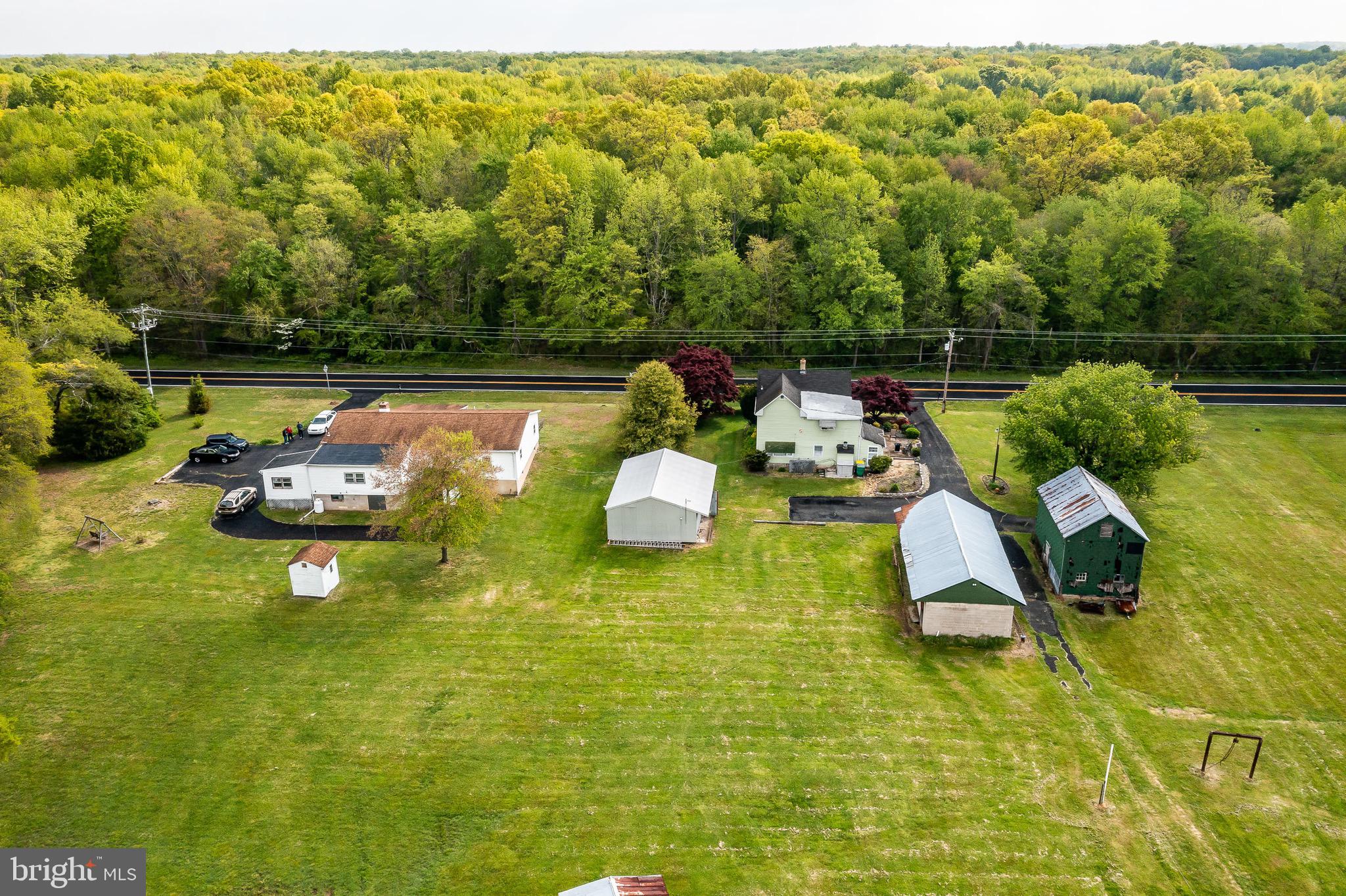 2956 Frazer Road Newark, DE 19702 - Photo 10 of 16 a couple of white chairs sitting on a swimming pool with a big yard