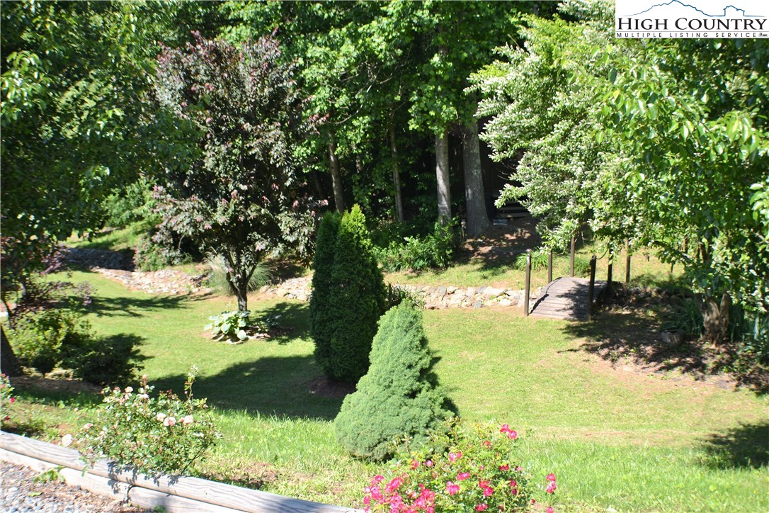 2156 Orchard Road Deep Gap, NC 28618 - Photo 8 of 35 a view of a garden