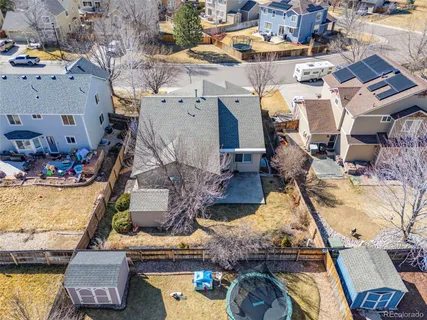 an aerial view of a house with a garden