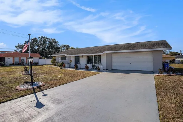 a house with yard in front of it