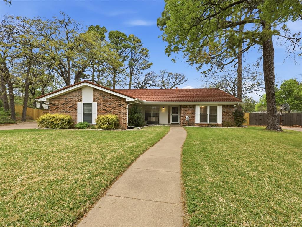 View of front of house with brick siding