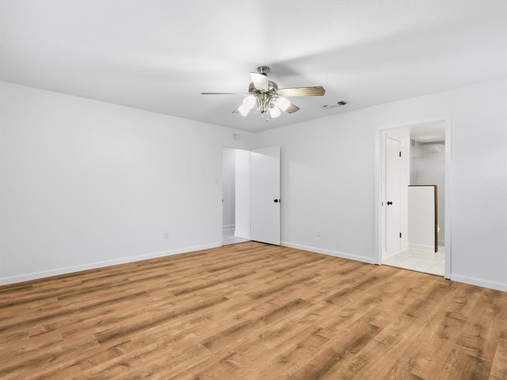 209 Valley View Court Azle, TX 76020 - Photo 28 of 39 Unfurnished bedroom with light wood-type flooring and ceiling fan